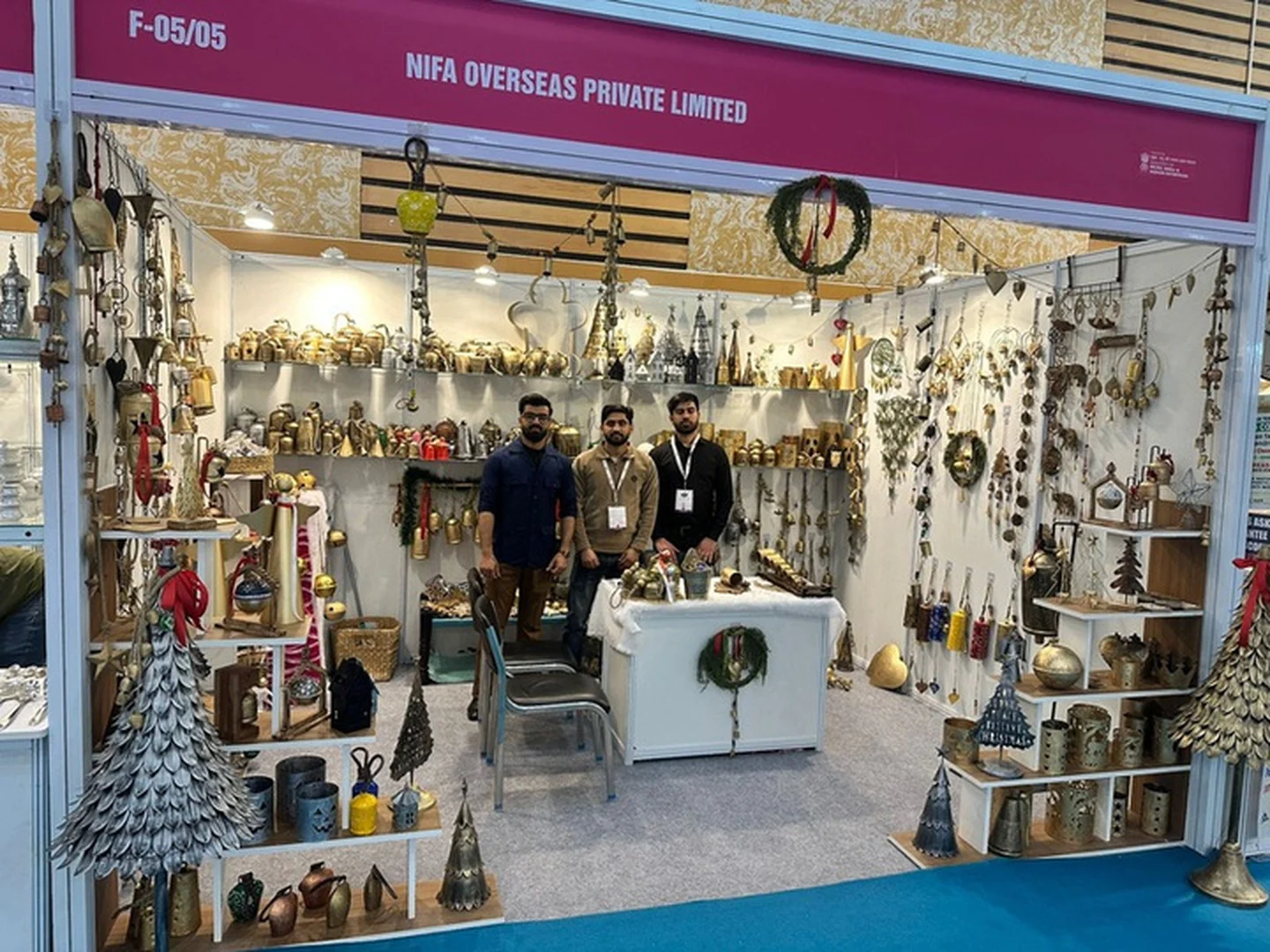 Nifa Overseas trade fair stand displaying handmade metal bells, hanging bells and Christmas décor for international B2B buyers